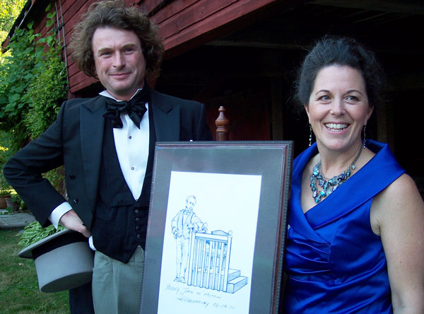 Peter Hill, dressed as Sir John A. Macdonald, and sculptor Ruth Abernethy with the sketch of the proposed bronze scupture