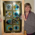 Bernice wins stained glass panel