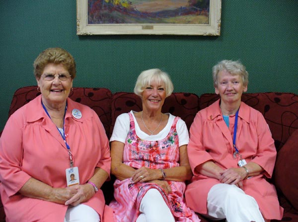 Prince Edward County Memorial Hospital Auxiliary volunteers Helen Hotston and Nancy Finnegan, flank Dorothy Hymus on the new couch purchased using donations in memory of the late Bob Hymus, through the hospital's Remembrance Fund.