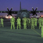 8 Wing Trenton Commander takes the salute at Cease Ops ceremony in Kandahar