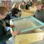 Workshop participants learn how to build cold frames