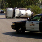 Septic truck rolls over on County Road 10