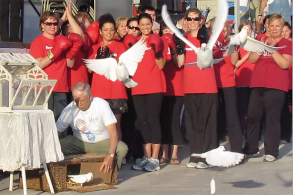 Ashley Berwick releases doves at PEC Relay for Life