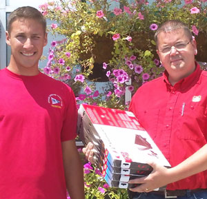 Adam Busscher, of Picton Home Hardware, donates four solar panels that will charge Sandy's large marine battery over the course of the 450 mile trip. "The battery will power my autopilot, which steers the boat when I am sleeping; the radio, which will be used for coast guard check in's and communication with other vessels; my cabin lights, and so many other things on board."