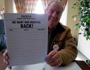 Dave Gray with the "We Want Our Hospital Back" petition. 