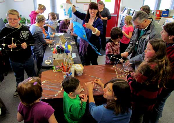 A good crowd at the Bloomfield Public Library Thursday, creating lanterns, under the guidance of Suzanne Larner.