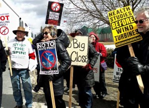 More than 100 people endured freezing cold and bitter winds to show opposition to Gilead Power’s project at Ostrander Point, wpd Canada’s White Pines project, and Algonquin Power’s project on Amherst Island. - Bernadette Fischer photo