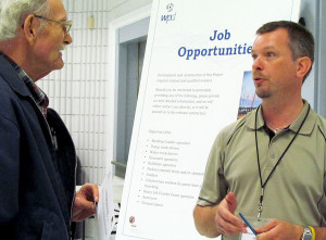wpd's Kevin Surette chats with a visitor to the wpd interconnection line open house