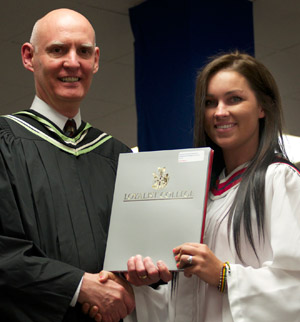 Scott Williams, Loyalist College Board of Governors, presented Emily Meyers of Picton with a Paramedic diploma and the County of Lennox and Addington Ambulance and Emergency Services Award.
