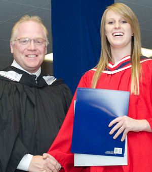 Gary Dyke, Board of Governors, presented Samantha Caines of Ameliasburgh with a Social Service Worker diploma and a Bayfield Treatment Centres Award for academic performance.
