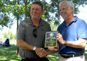 The second annual PECSA Scott Wentworth Award for excellence in coaching was presented Saturday by Wentworth, to Chris Weir, U9 coach.