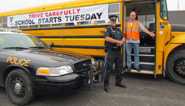 PEC OPP Community Services Officer Anthony Mann and driver Terry Kewley remind motorists to be aware.