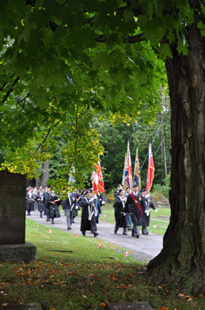 Legion members, veterans and military personnel parade into Glenwood Cemetery to the Maolehill Veterans’ section for remembrance ceremony Saturday morning. Photo Ross Lees