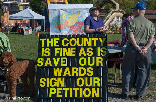The County is Fine As It Is booth asking residents to sign a petition to keep the wards and councillor representation as is.