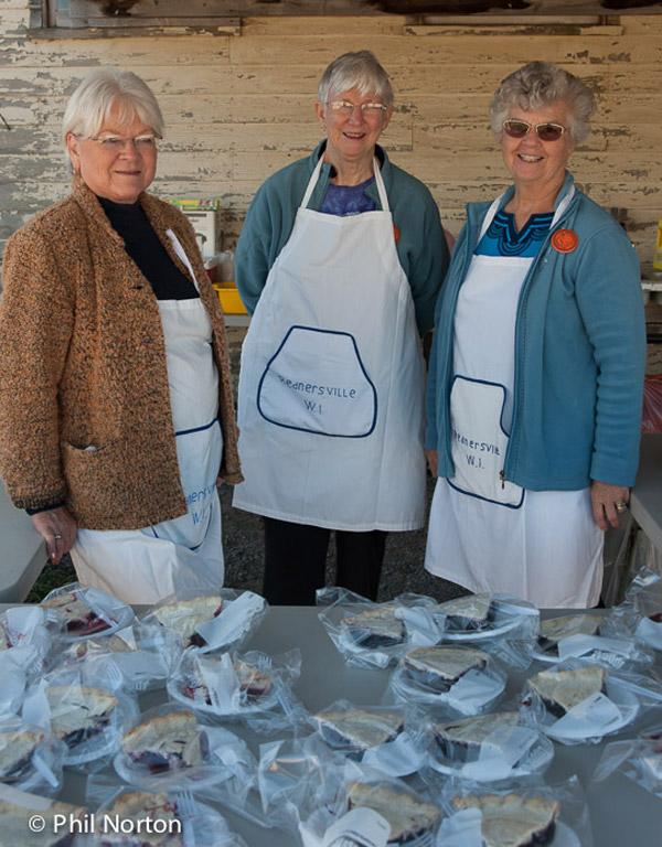 Save your fork - pie is coming! Selling pies are Rednersville Women's Institute members Margaret Vandervelde, Vivian Rose, past president, and Marlene Corfield, past president. Note: member Evelyn Peck is the Ontario provincial W.I. president and is currently in India at a conference of the ACCW. The pear crumble pie was made with home-grown pears.
