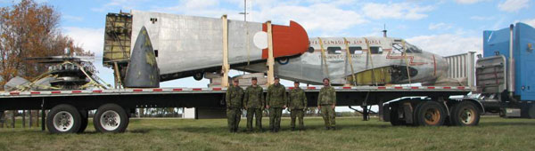 The chopped up C-45 Expeditor is shown here with the 8 Wing ATESS RAS team of MCpl. David Rehberg, MCpl. David Daley, WO. Jason Houle, MCpl. Bill Ashton, Sgt. Marc Frigault, and Mr. Paul Botting. Submitted photos