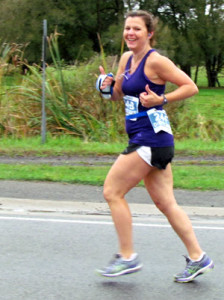 Debbie Seeley thumbs up in the rain.