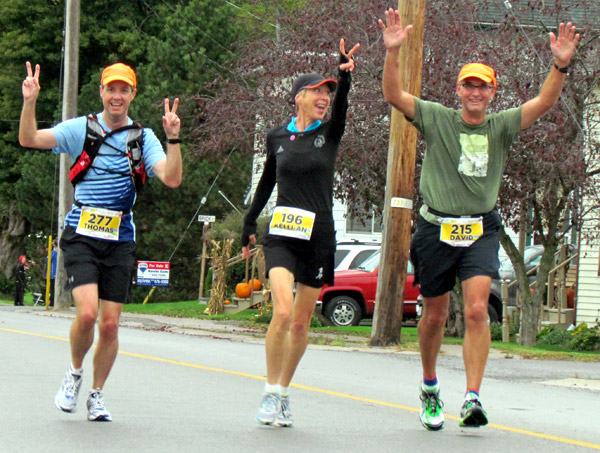 All smiles running through Bloomfield were Thomas White, Keli-An Lawrance and David Miehm, all of Burlington. 