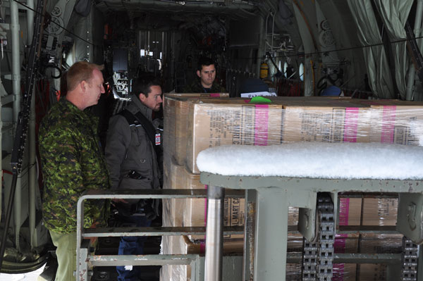 The first pallet is placed inside the Herc. -Photo Ross Lees