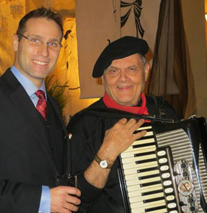 Gala co-chair Dr. Josh Colby with accordion player Neal Pupulin
