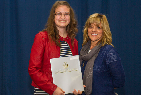 Katie Norris (left), second-year Early Childhood Education student, was presented the Association of Early Childhood Educators of Ontario Award, by Professor Jennifer DeGroot. Katie is a PECI graduate. 