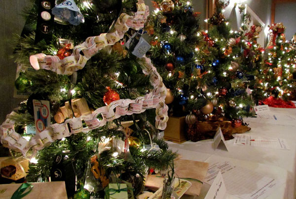 One of Macaulay House Museum's trees features a promotion of the annual Car Rally and includes numerous related gifts placed on, and underneath the tree.
