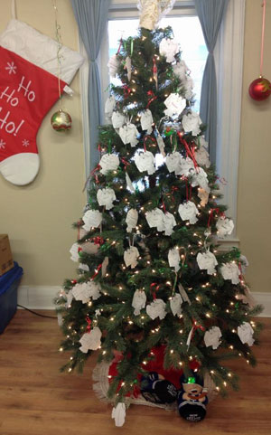 Campaign assistant Elisha MacDonald says 337 children have been looked after so far, and shares this photograph of the tree full on angels in need as of Dec. 2.