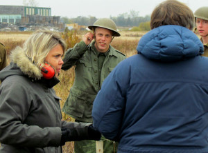 Picton's Taylor Terpstra listens director Robin Bicknell, and art director Peter Twist, discuss the scene.