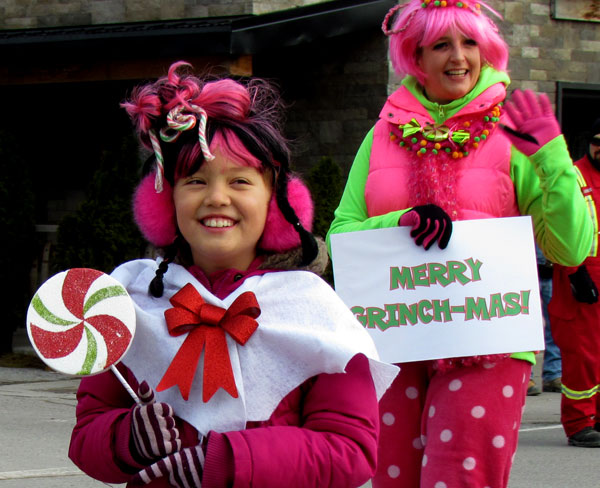 Tina WhoKonecny and friend wish everyboy a Merry Grinch-mas