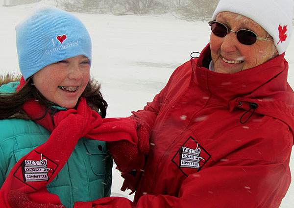 Lindsay Stokes was "caught" enjoying winter at the Picton docks and was rewarded with a scarf from committee member Bev Campbell.