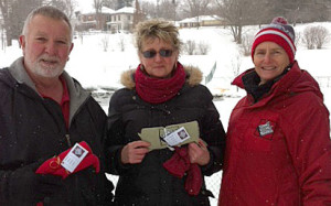 Vicky Sutherland, right, presented David and Alice Braidford with Picton Recreation 'Winter Active' scarves.