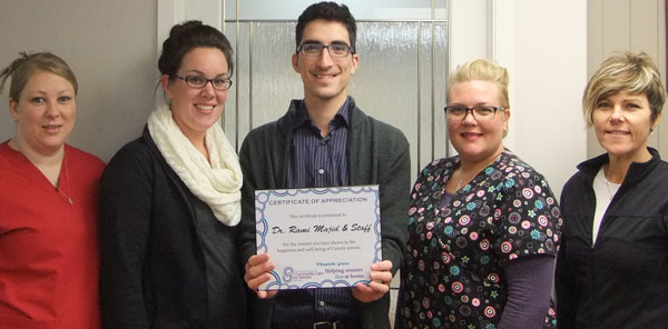 Community Care presented a certificate of appreciation to Dr. Majid and members of his staff.  L-R Christina Girard, Renee McCaffery, Dr. Rami Majid, Jennifer Bouman, Sandy Jones. Absent from photo Amanda Wallace.