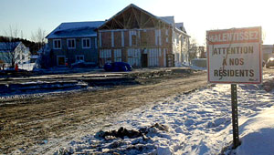 What remains of the seniors complex. The sign asks people to slow down and watch out for residents. Jeanette Arsenault photo