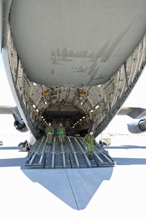 CAF personnel prepare to empty the last CC-177 Globemaster aircraft used to fly personnel out of Afghanistan. Photo by Ross Lees 