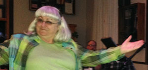 Karen Empringham, decked out in lucky green, won the evening's draw.