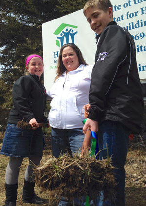 Connie Matthews and children Cole and Hannah are ready to roll up their sleeves to create a home together