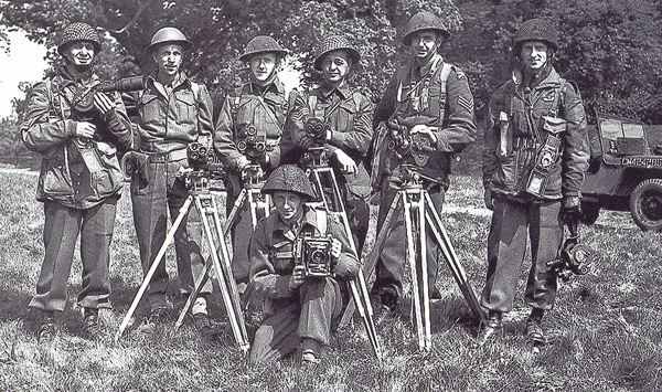Army cameramen assigned to capture the first wave of the D-Day invasion. (Library and Archives Canada PA#206120)