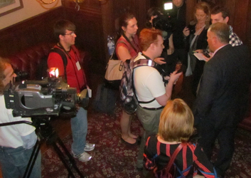 Todd Smith in a media scrum that included several students from Loyalist College's new journalism program with Trent University.