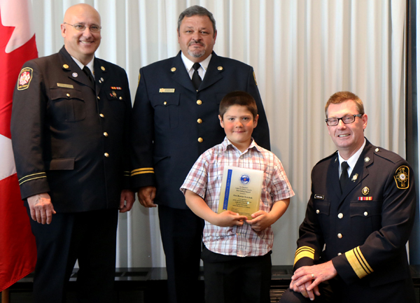 From left: Richard Craibbe, Chief Training Officer, Oakville Fire Department, Fire Safety Awards Selection Committee, Mike Branscombe, Fire Prevention Officer, Prince Edward County, Alex Korchuk and Ted Wieclawek, Fire Marshal of Ontario