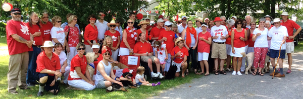 Prinyer's Cove neighbours mark decade of celebration For the past 10 years, neighbours in the Prinyers Cove Crescent area have been honouring Canada’s birthday with a community parade, party and lots of food. This year’s event included an extra ingredient: donation bins in support of the food bank in Picton. Shown in B Ernst's photo are some of the party-goers in their Canadian regalia. The Ernsts and Chambers co-hosted the celebration.