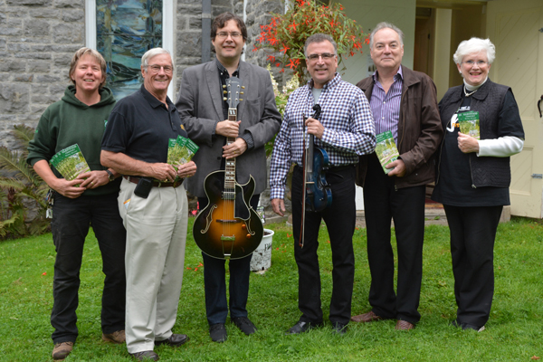 Helma Oonk, Glenwood Manager; Rod deCourcey-Ireland, Glenwood Board Member; Reg Schwager, guitarist Lenny Solomon, violinist; Brian Barlow, PEC Jazz Festival and Elizabeth Crombie, with Royal LePage.