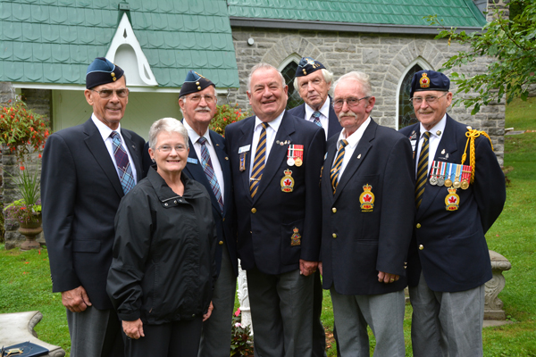 2014 event organizers, front left to right: George Court, Past President 415 Wing Royal Canadian Air Force Association (RCAFA); Sandra Latchford, Chair Glenwood Cemetery Board; Doug Yates, 415 Wing RCAFA; Gil Charlebois, Member of Branch 78 Royal Canadian Legion (RCL); Robert Bird, President 415 Wing RCAFA; Pat Burrows, President Branch 78 RCL and Mike Slatter, 1st Vice & Parade Marshal Branch 78 RCL. Absent Rev. William Kidnew, Padre Branch 78 RCL.