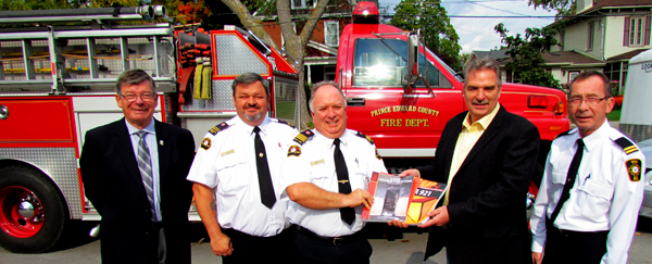 Mayor Peter Mertens, Fire Prevention Officer Mike Branscombe, Deputy Fire Chief Robert Rutter, Union Gas' Phillip Langlois and local Fire Protection Advisor Dan Koroscil gathered for the $5.000 grant announcement.