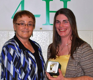 4H president Sherrie Brown presented Shannon Langridge the CIBC gold watch. 