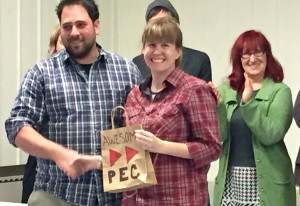 Lenny Epstein and Christine Renaud congratulate Louise McFaul (centre) on her Fairy Doors project win.