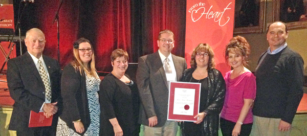 Pictured at the gala event from left, Leo Finnegan, Briar Boyce and Hazel Lloyst on behalf of the PECMH Foundation, Adam and Chrissy Busscher on behalf of Picton Home Hardware, Amy McKinley, a registered practical nurse at Prince Edward County Memorial Hospital and Ken Menlove, director on the foundation board. Photo by Shannon Coull