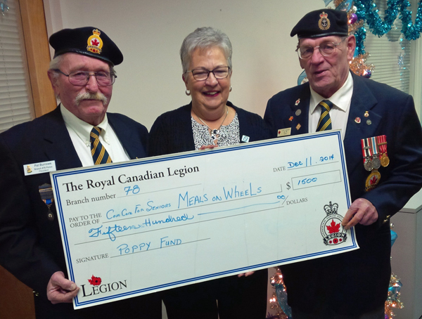 Pat Burrows, President of Branch 78; Barbara Lyons, Vice President of Community Care; Rusty Harrison, Chair of the Poppy Fund for Branch 78 of the Royal Canadian Legion in Picton.