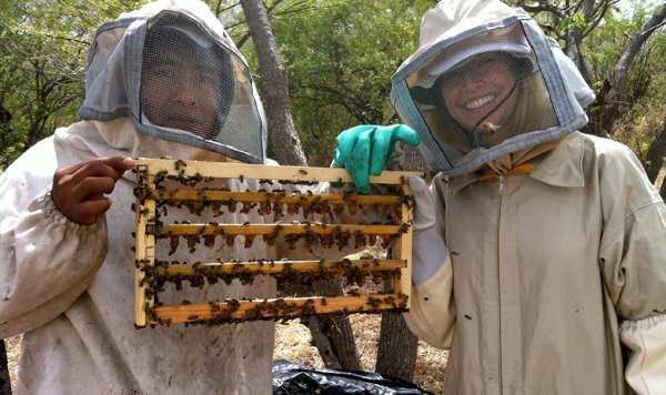 Sarah French with Ingemann, in Nicaragua, who sells queen bees to local farmers to help improve the honey every year.