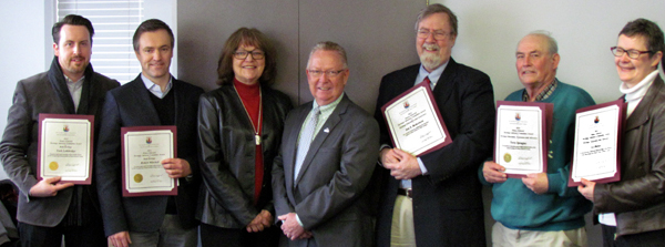 Prince Edward Heritage Advisory Committee certificates honouring champions of local heritage were presented Wednesday.