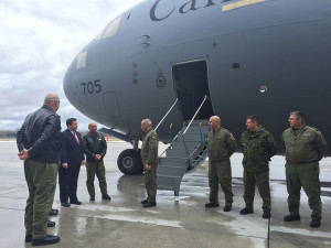 Defence Minister Jason Kenney (second from left) joined Lieutenant-General Yvan Blondin, commander of the Royal Canadian Air Force, to witness the inaugural landing, at 8 Wing Trenton, of the RCAF’s fifth CC-177 Globemaster III in Canada.